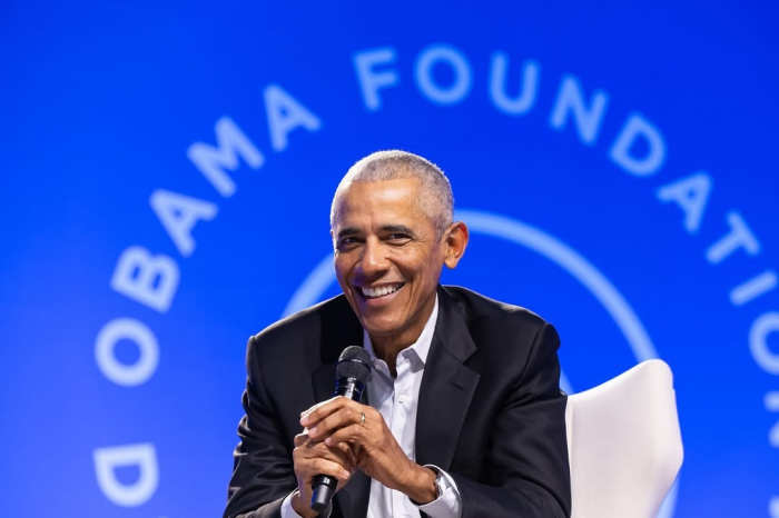 A smiling president Obama speaking at an Obama foundation event, Photo Credit: barackobama/Instagram