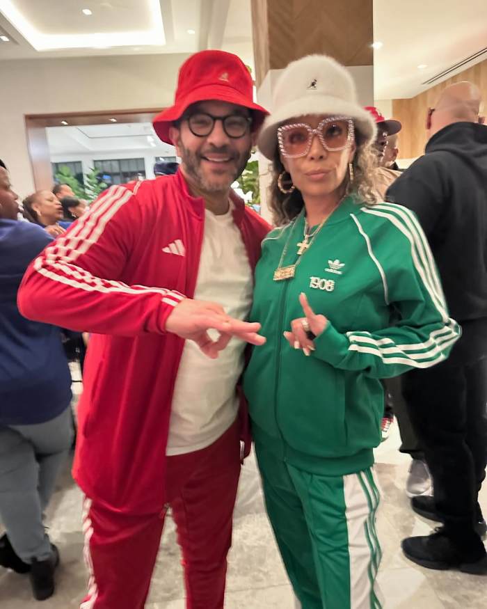 Sunny Hostin and her husband Dr. Emmanuel Hostin at 90s themed party, Photo Credit: sunny/Instagram