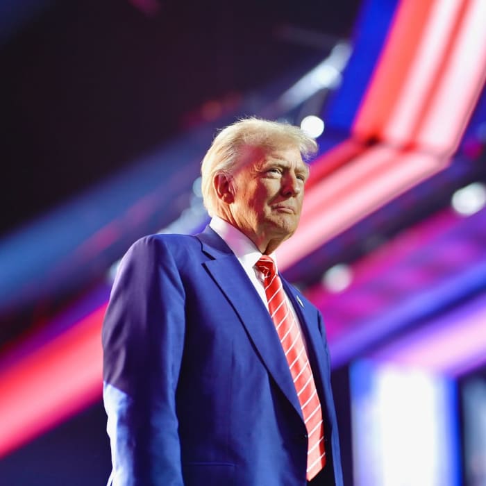 Donald Trump standing on a stage, Photo Credit: realdonaldtrump/Instagram