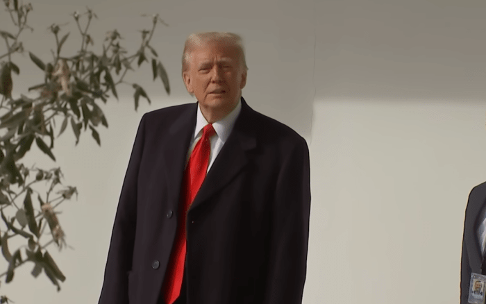 President Donald Trump looking off into the distance, Photo Credit: CNN/Youtube