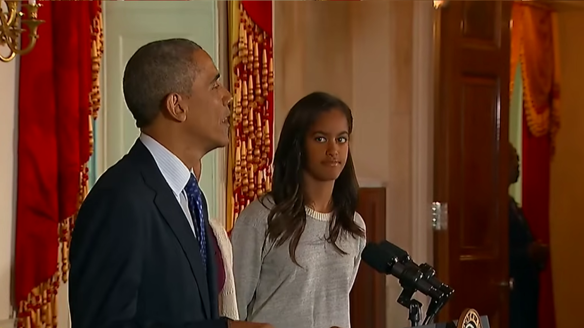 Malia Ann, formerly known as Malia Obama, next to her dad when he was in office, Photo Credit: Entertainment Tonight/Youtube