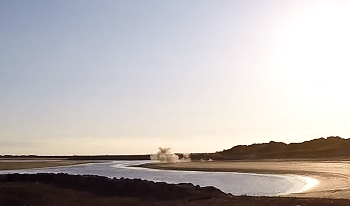 Authorities detonating the unexploded World War II mine, Photo Credit: Adam Why/Youtube