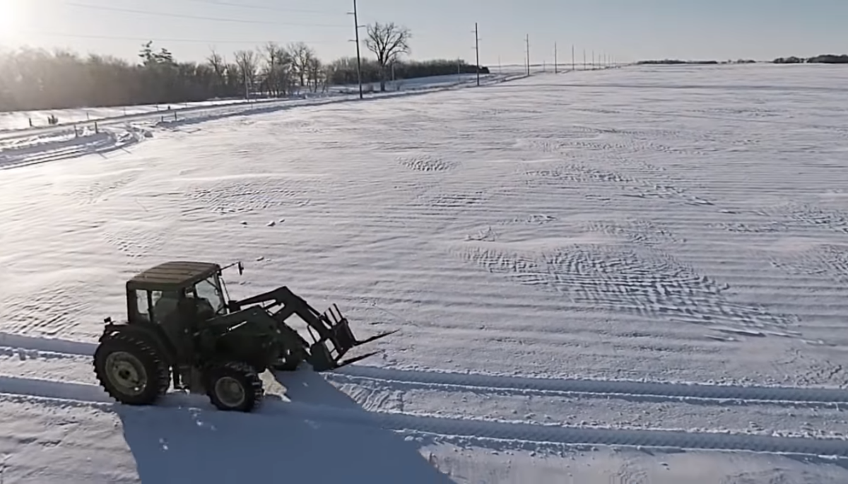 Family farm's tractor making tracks in the snow, Photo Credit: Prunty Farms/Youtube