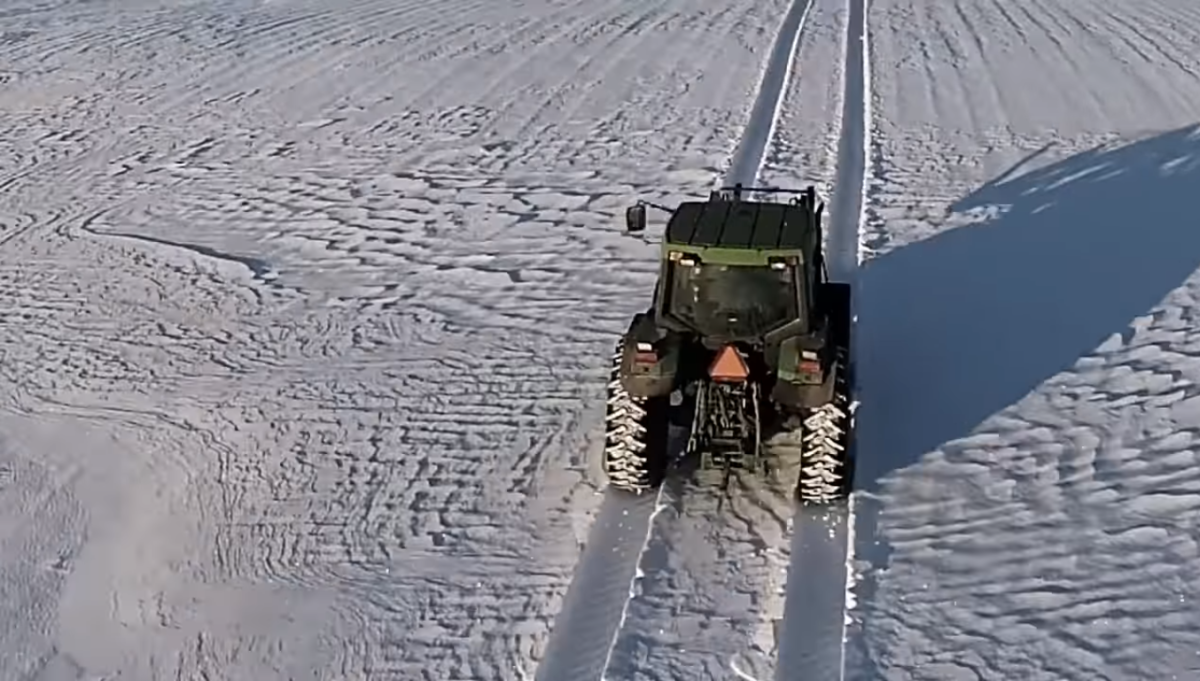 Family farm's tractor making tracks in the snow, Photo Credit: Prunty Farms/Youtube