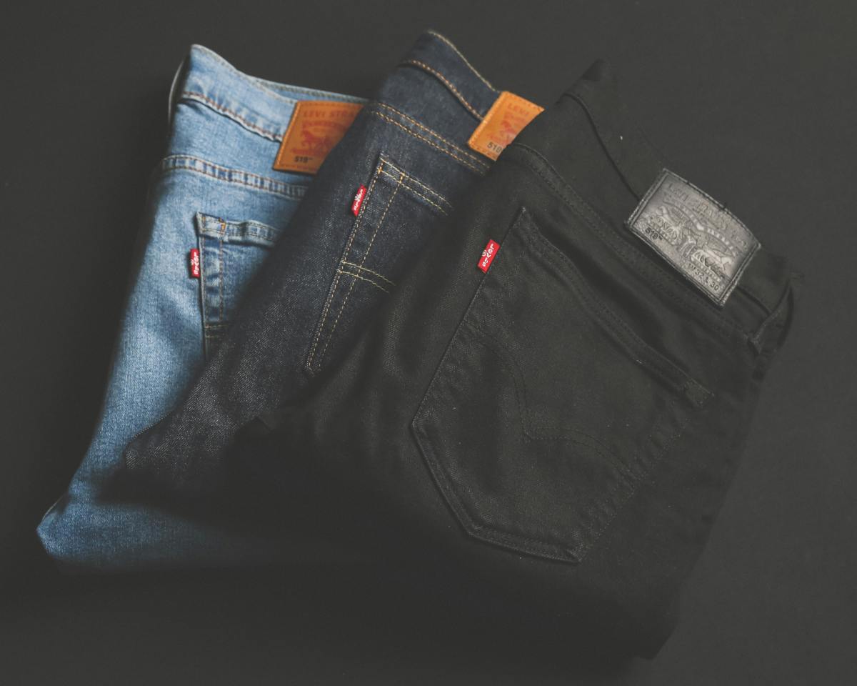 Three different colored pairs of jeans, Photo Credit: Pexels