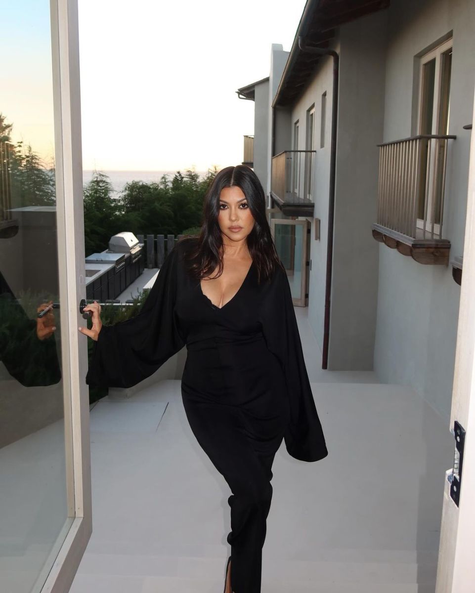 Kourtney Kardashian standing in a doorway, Photo Credit: kourtneykardash/Instagram