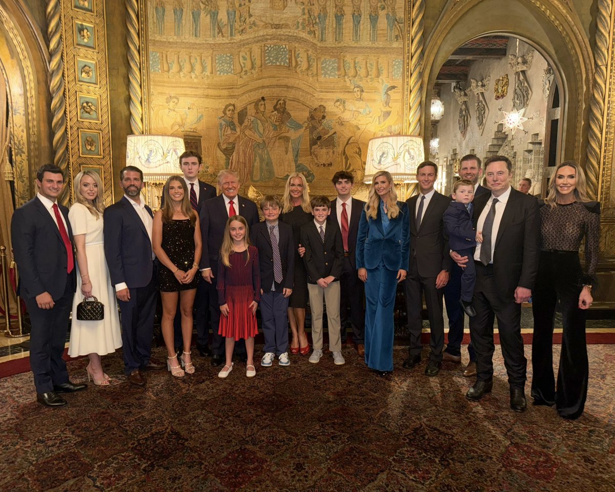 Donald Trump standing with his family, Photo Credit: Kai Trump/X