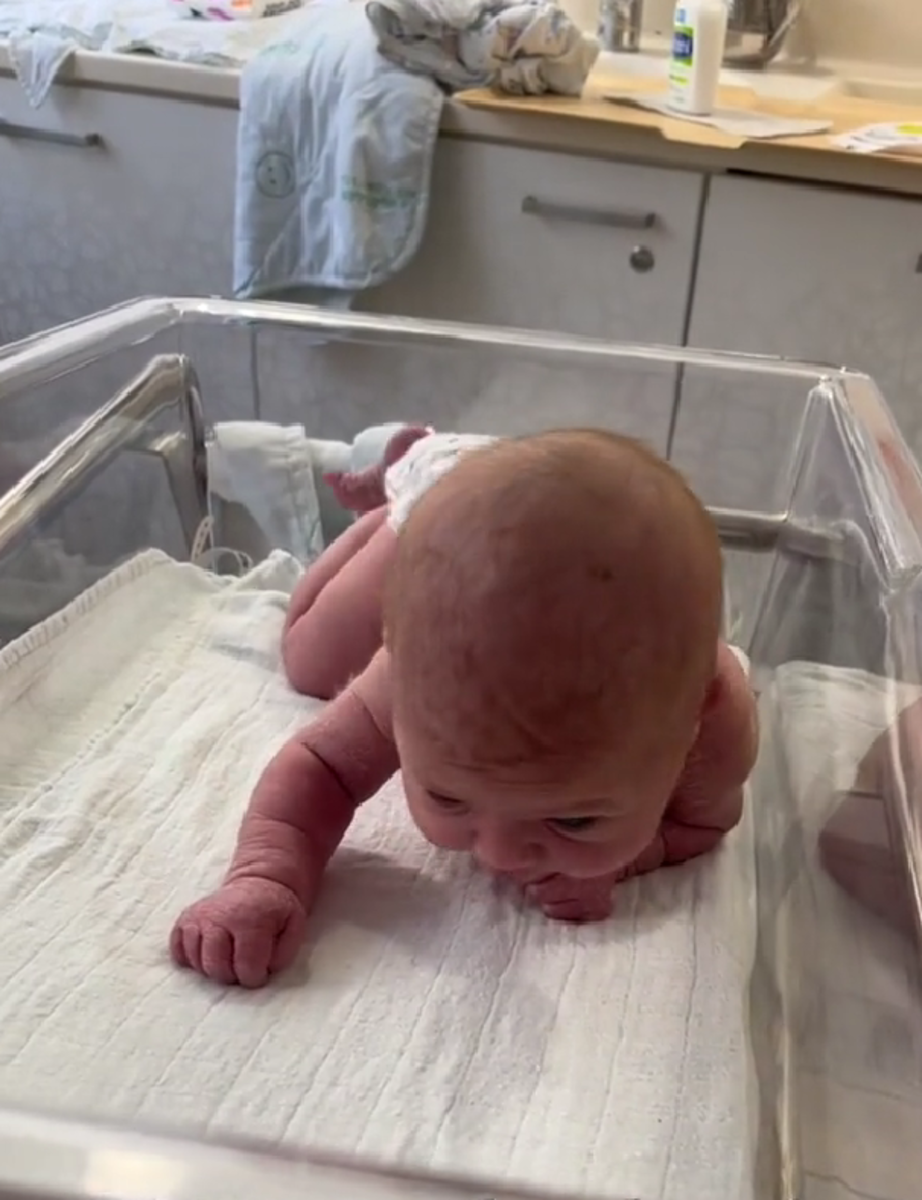 Newborn Nyilah Daise Tzabari seen crawling and lifting her head at only 3 days old, Photo Credit: samantha_elizabeth__/Tiktok