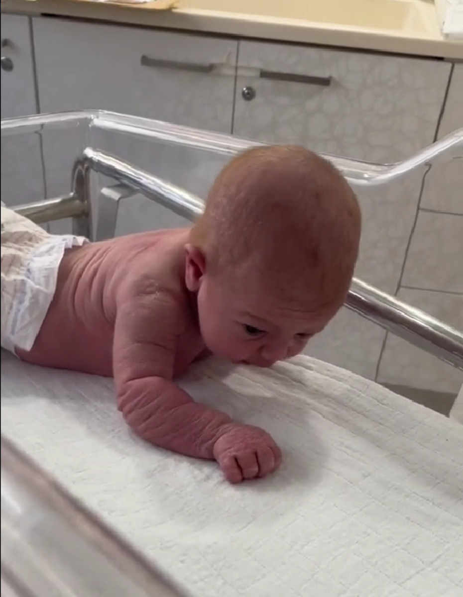 Newborn Nyilah Daise Tzabari seen crawling and lifting her head at only 3 days old, Photo Credit: samantha_elizabeth__/Tiktok