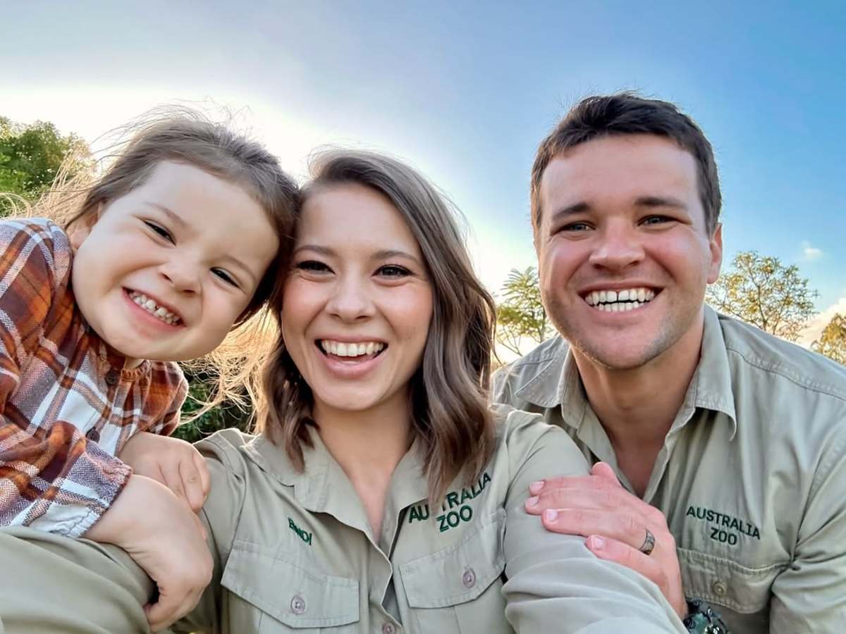 Bindi Irwin posing with her husband and daughter, Photo Credit: bindisueirwin/Instagram