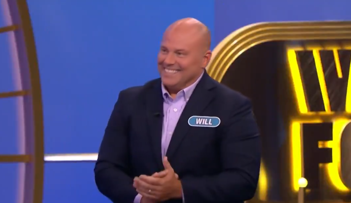 Contestant Will Jordan smiling and clapping, Photo Credit: Wheelrob/X