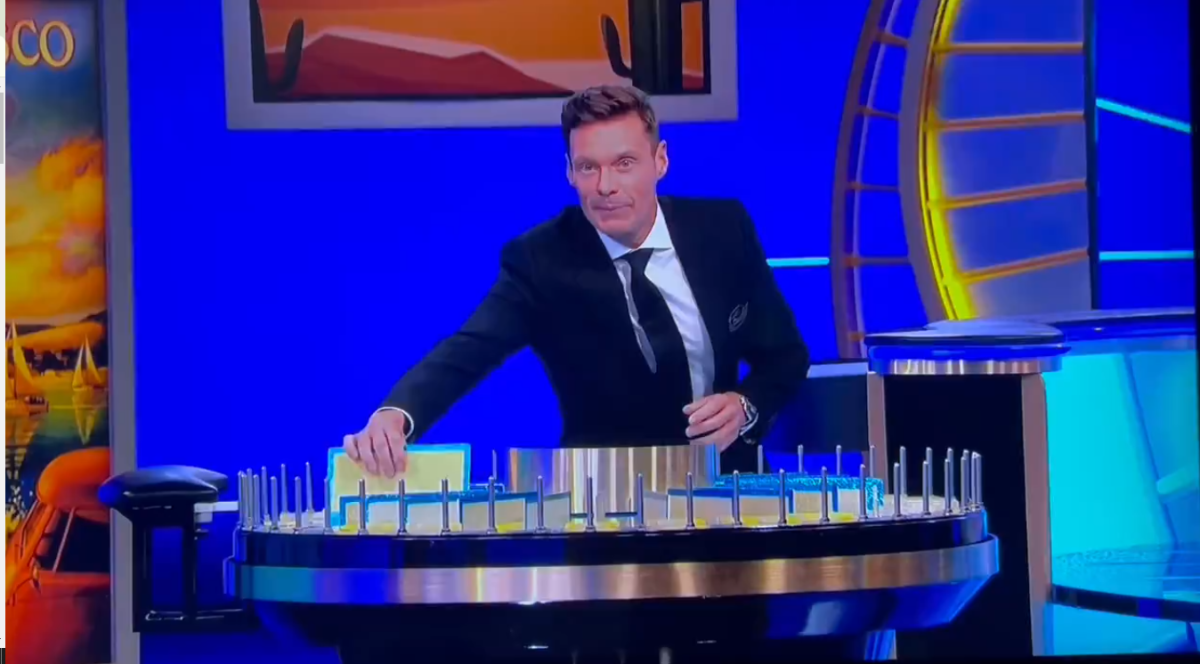 Host Ryan Seacrest looking at the camera while spinning the wheel, Photo Credit: GatoradeMVP/X