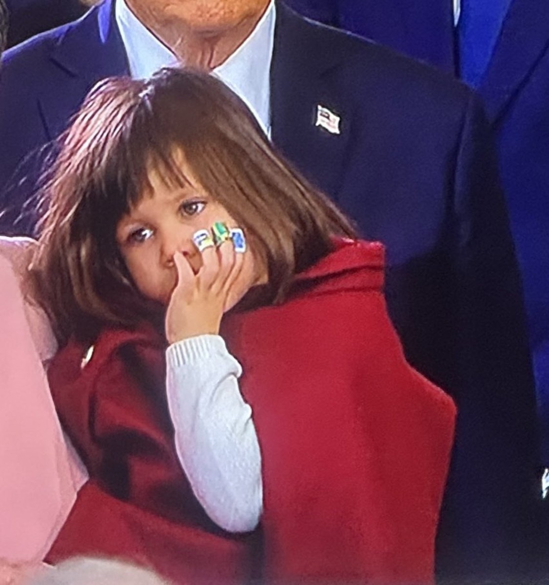 Vice President Vance's daughter with bandaids visible on her fingers during the inauguration ceremony, Photo Credit: Päm Schoen/X