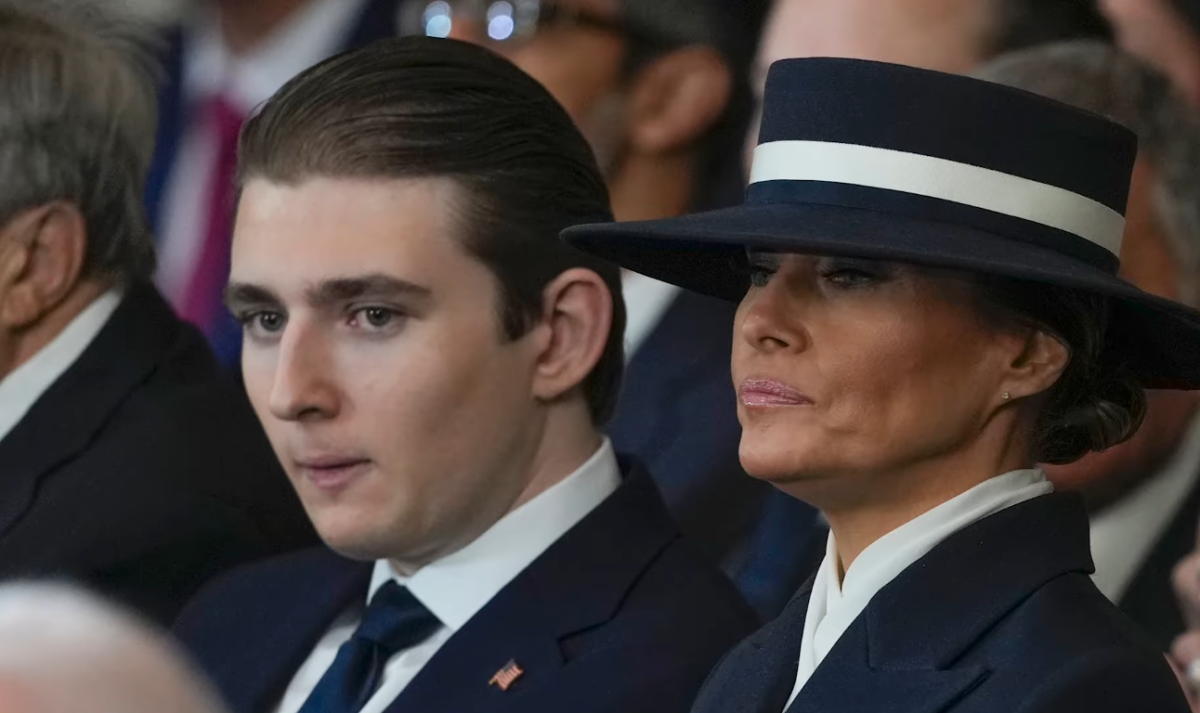 Barron Trump seated next to his mother Melania Trump during his father's inauguration, Photo Credit: Nicki Swift/Youtube