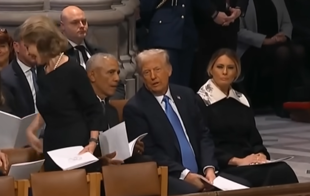 President Trump speaking to President Obama at Jimmy Carter's funeral, Photo Credit: Inside Edition/Youtube