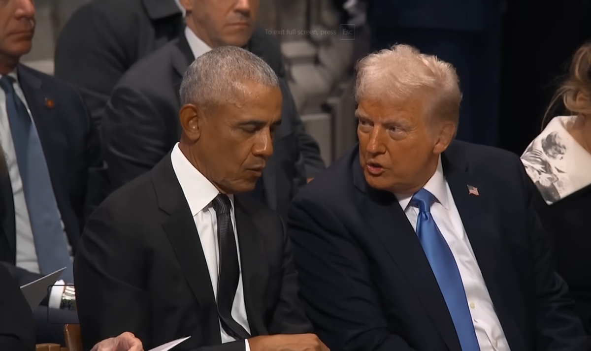 President Trump speaking to President Obama at Jimmy Carter's funeral, Photo Credit: Inside Edition/Youtube