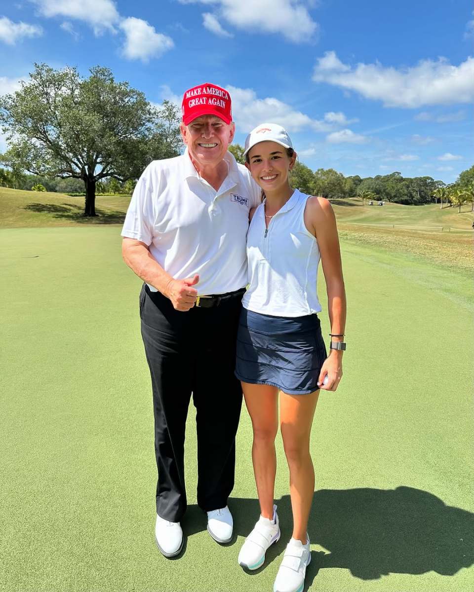 President Trump posing with his granddaughter Kai on the golf course, Photo Credit: kaitrumpgolfer/Instagram