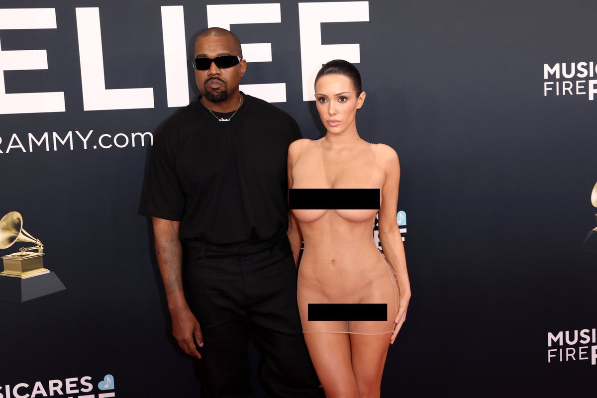 Kanye West and Bianca Censori facing the cameras on the Grammys red carpet, Photo Credit: Autism Capital/X