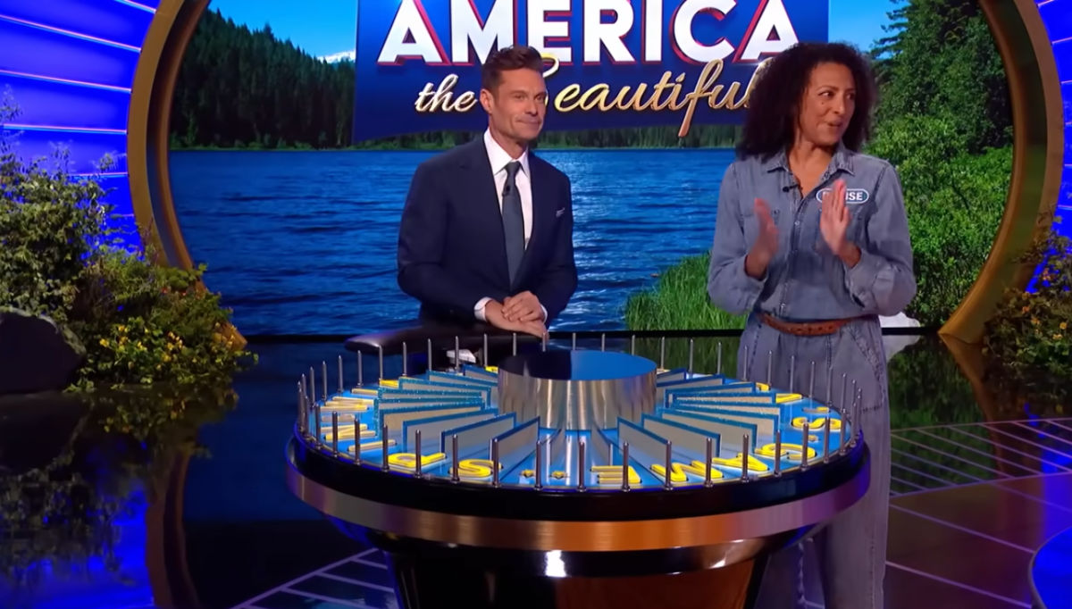 Ryan Seacrest and Denise Robinson in a 'Wheel of Fortune' episode, Photo Credit: Wheel Of Fortune/Youtube