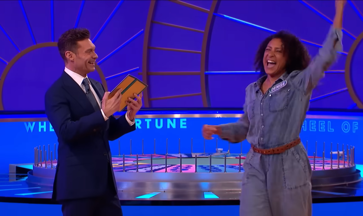 Ryan Seacrest and Denise Robinson in a 'Wheel of Fortune' episode, Photo Credit: Wheel Of Fortune/Youtube