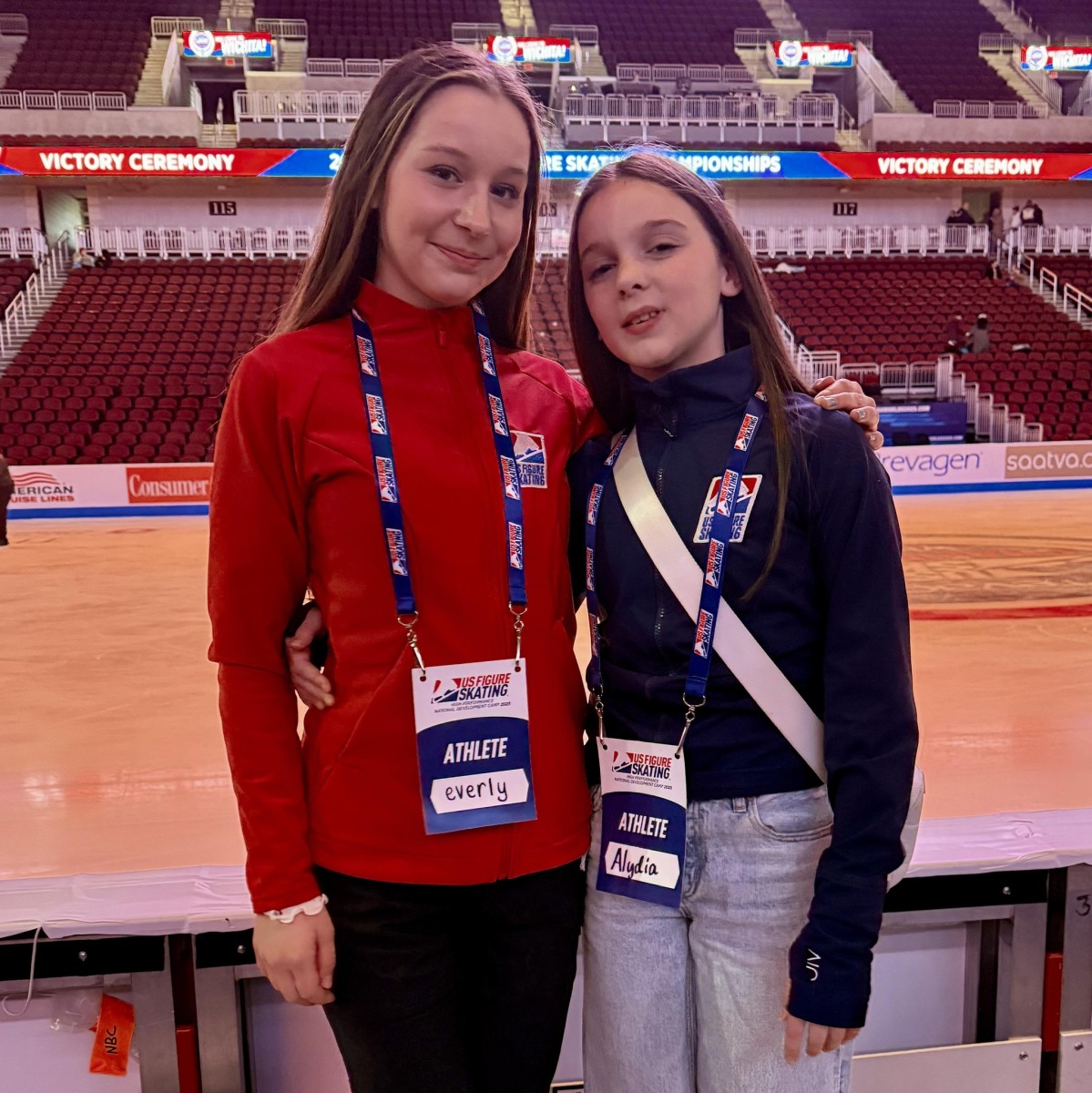 Everly and Alydia Livingston posing inside an ice skating rink, Photo Credit: Peter Livingston/Facebook