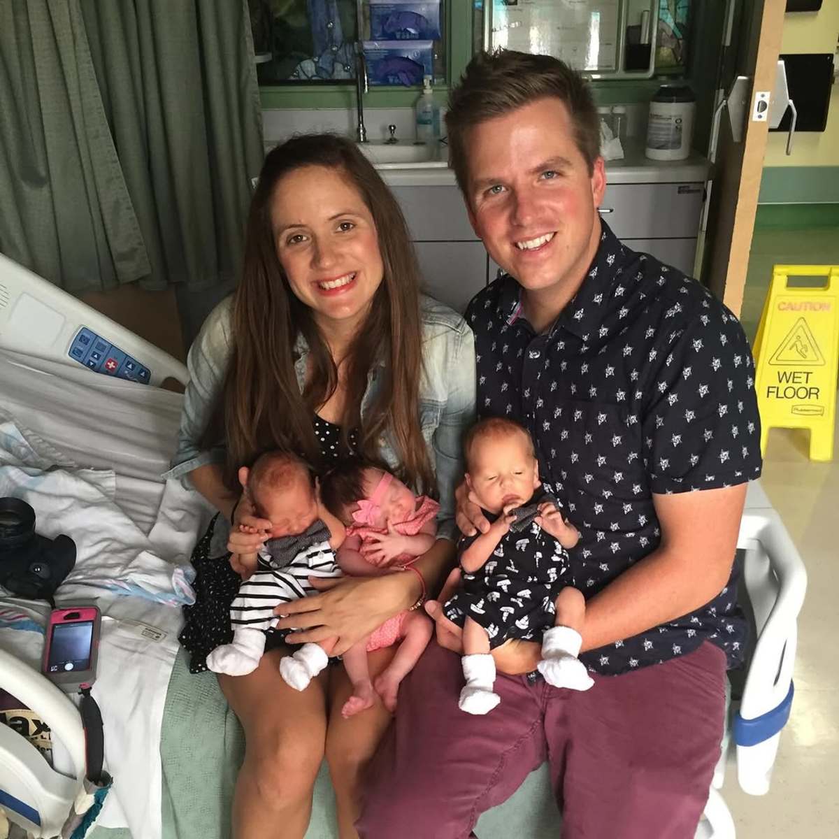 Desiree and Ryan Fortin holding their triplet babies, Photo Credit: theperfectmom/Instagram