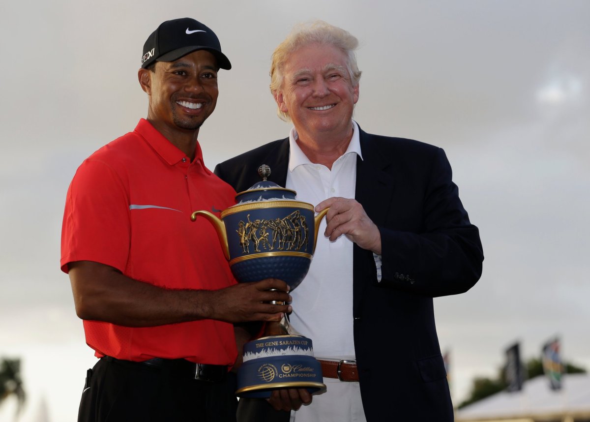 Tiger Woods holding a trophy with US President Donald Trump, Photo Credit: The Leagues/X