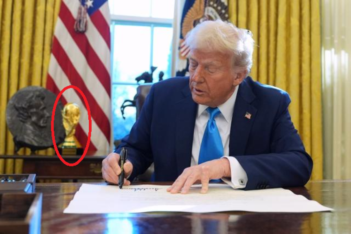 President Donald Trump signing a document, Photo Credit: Mario Nawfal/X